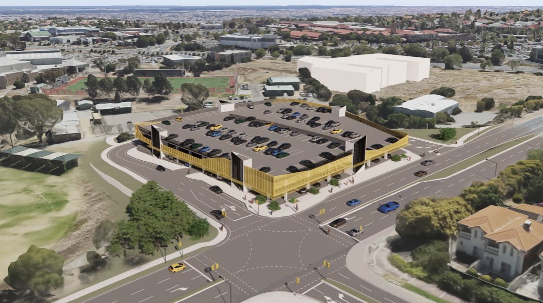 An illustrative concept drawing of the Golden Grove park n ride facility. The three level car park has rooftop car parking and is next to an intersection.