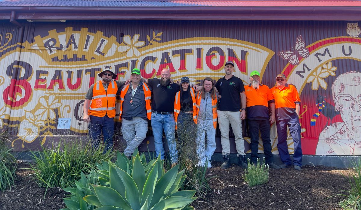 Rail Care SA Volunteers posing for a photo in front of Public Art